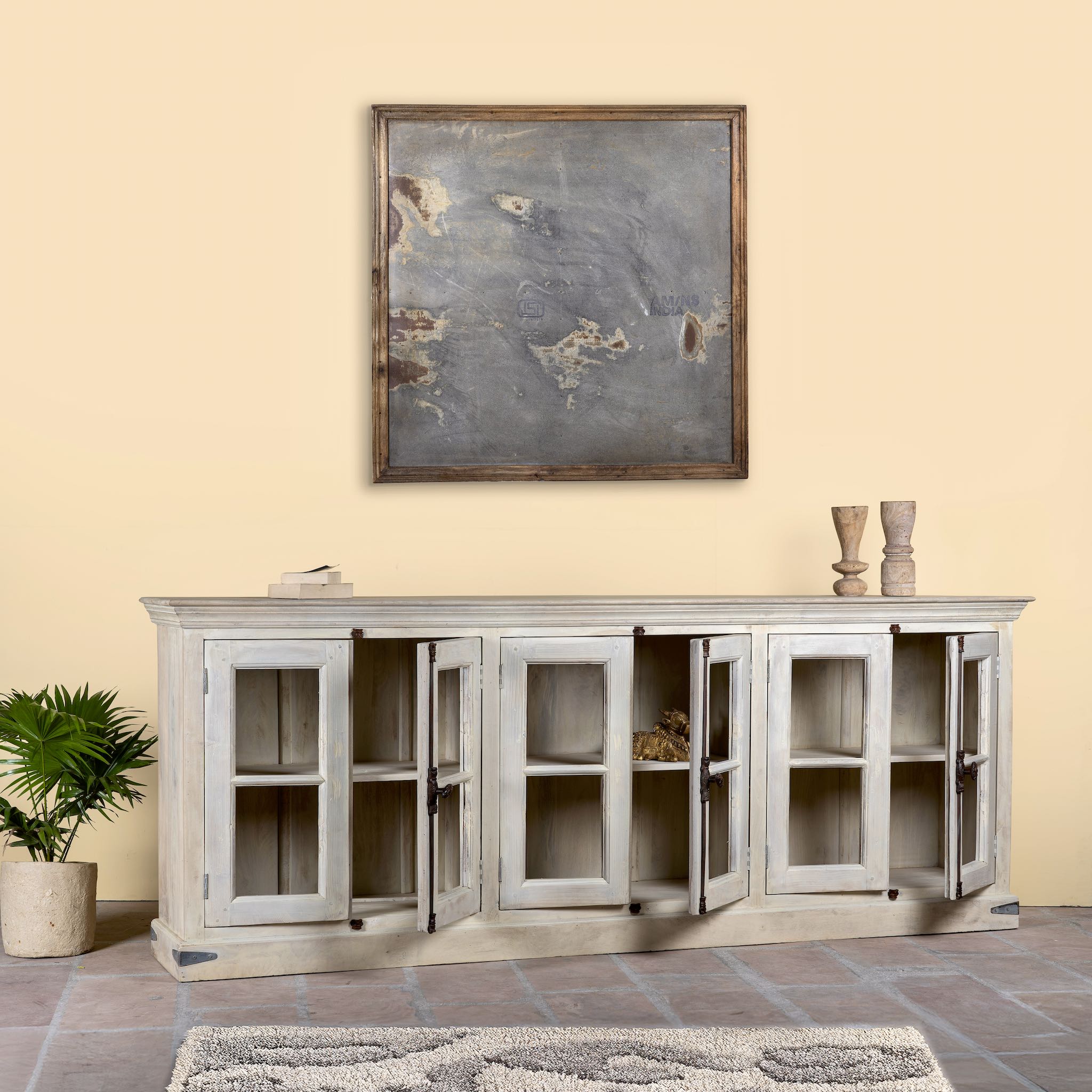 Open door image of a sandblasted reclaimed wood sideboard in Ibiza style with four glass-panelled doors, vintage Mediterranean furniture, 263×45×100 cm.