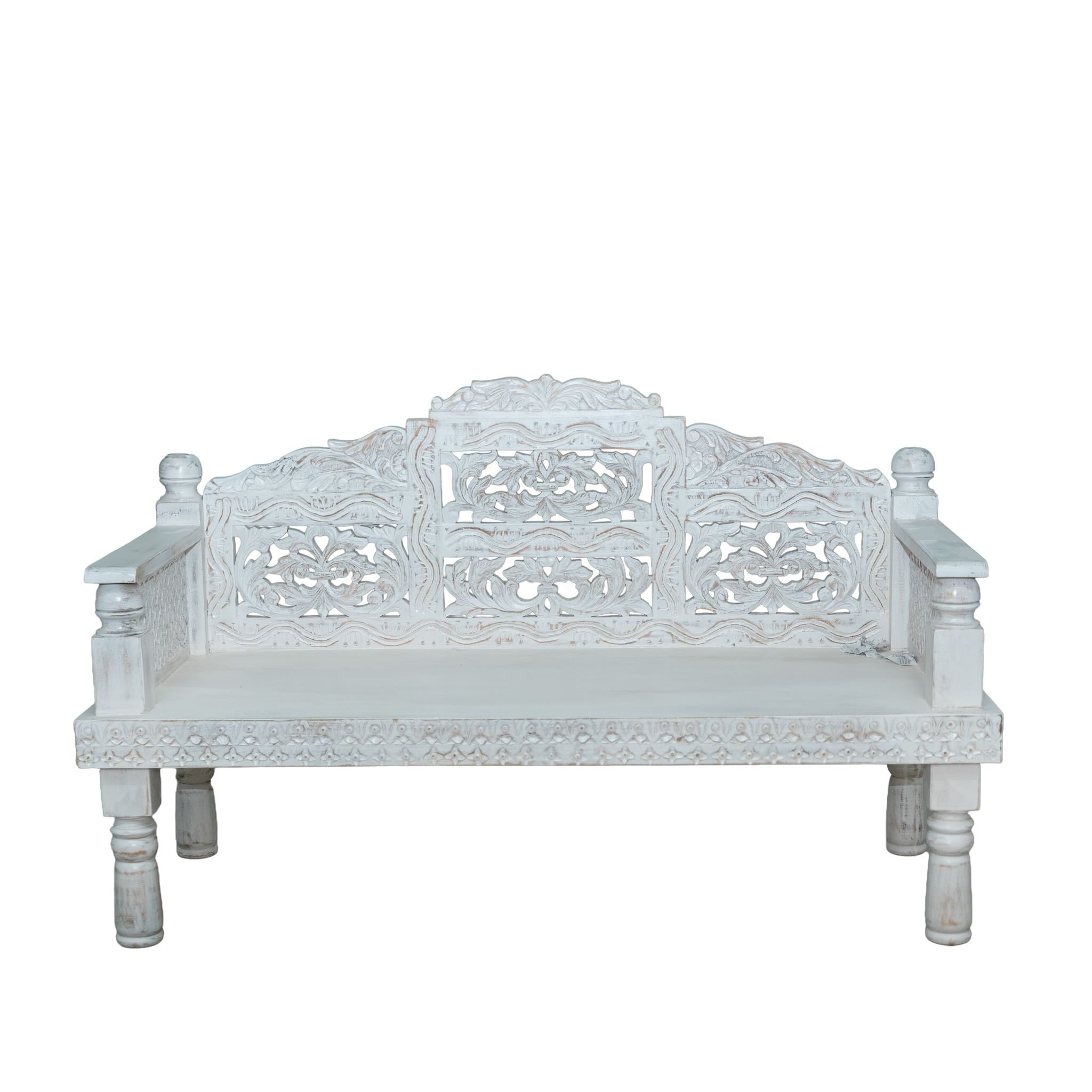 White background image of a hand carved mango wood bench Aikya, featuring intricate floral detailing and turned legs, representing traditional Indian craftsmanship and authentic hand carved wooden furniture design.