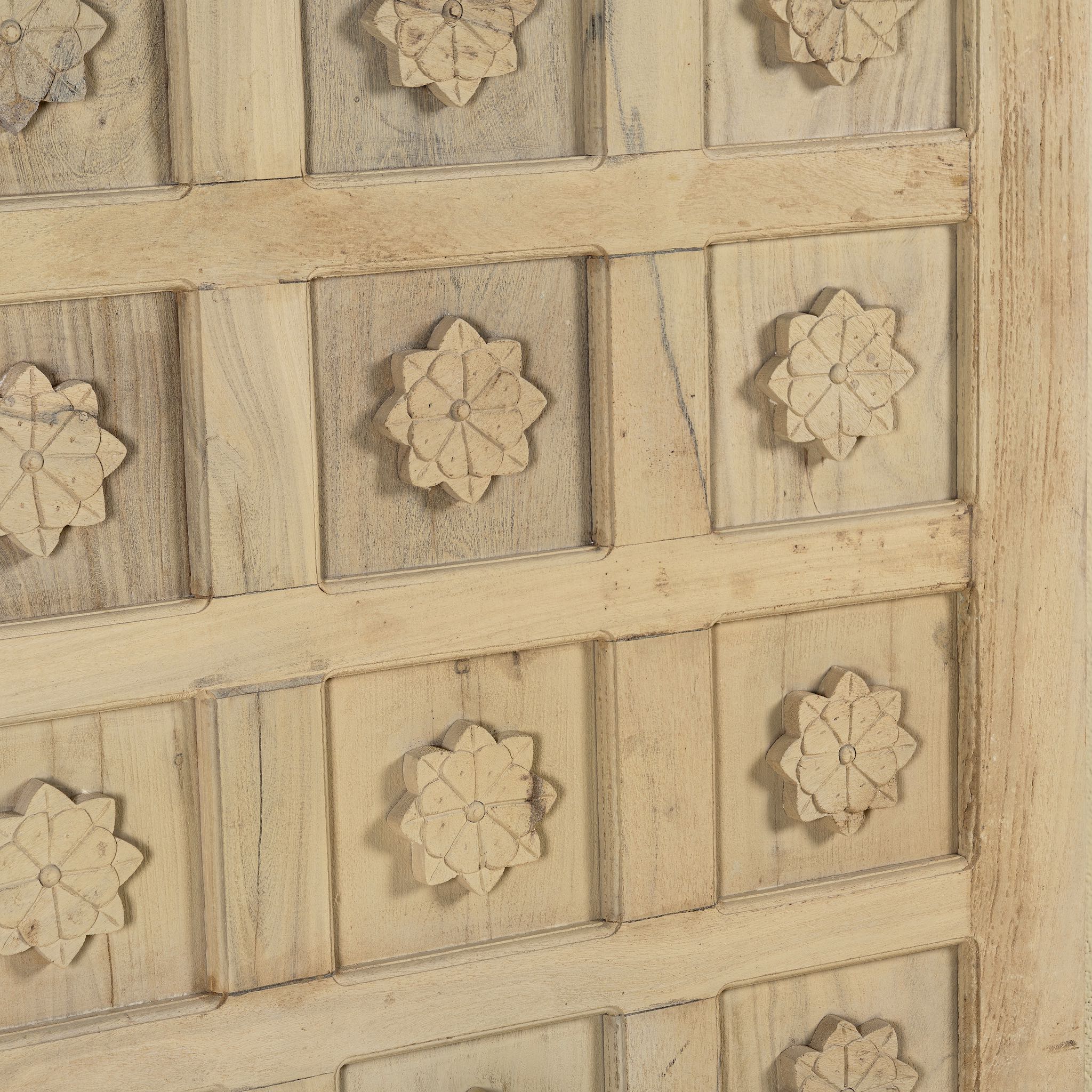 Wooden panel with floral carvings