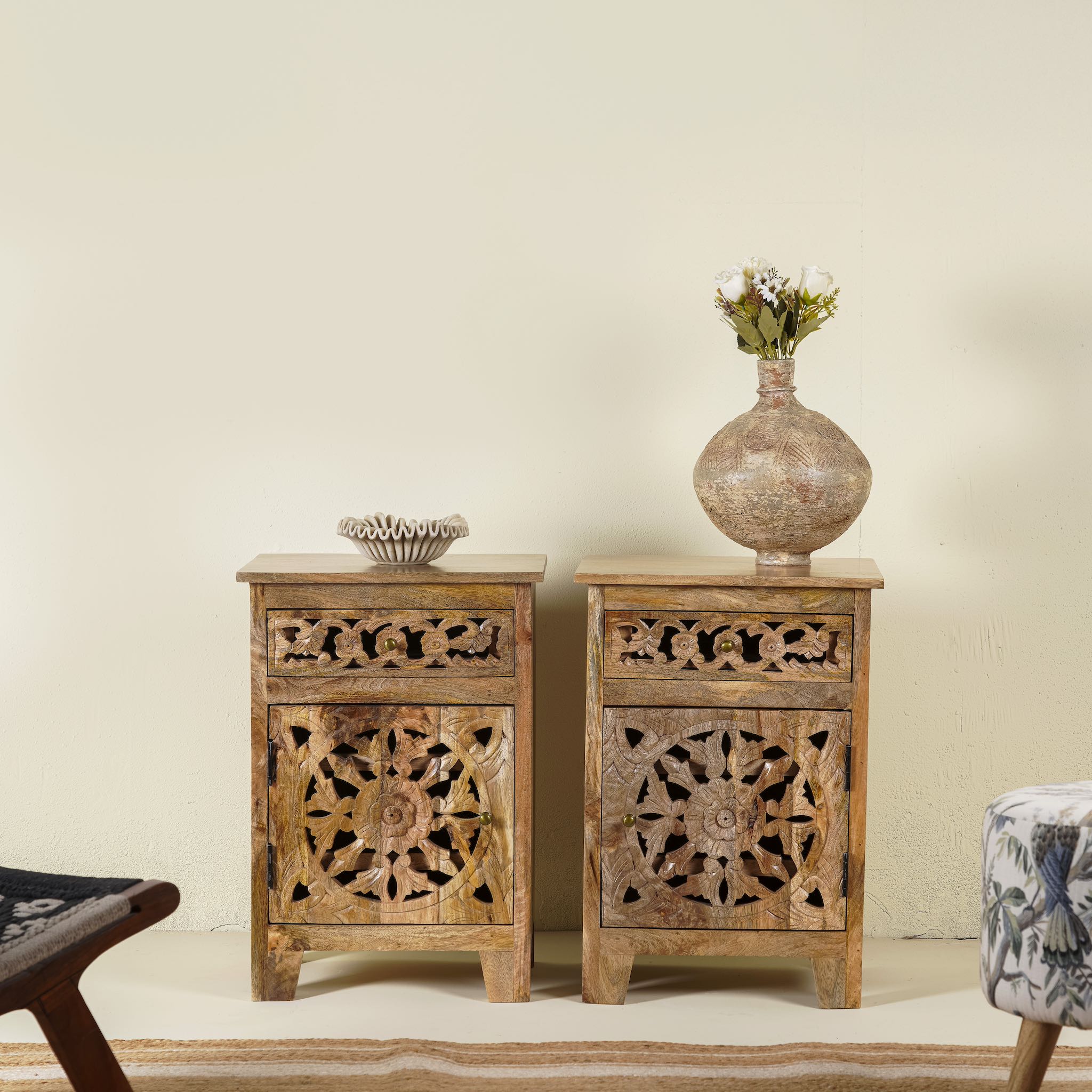 Pair of mango wood bedside tables with floral and geometric carvings; natural finish mango wood furniture ideal for bedroom furniture, 45 × 65 × 35 cm.