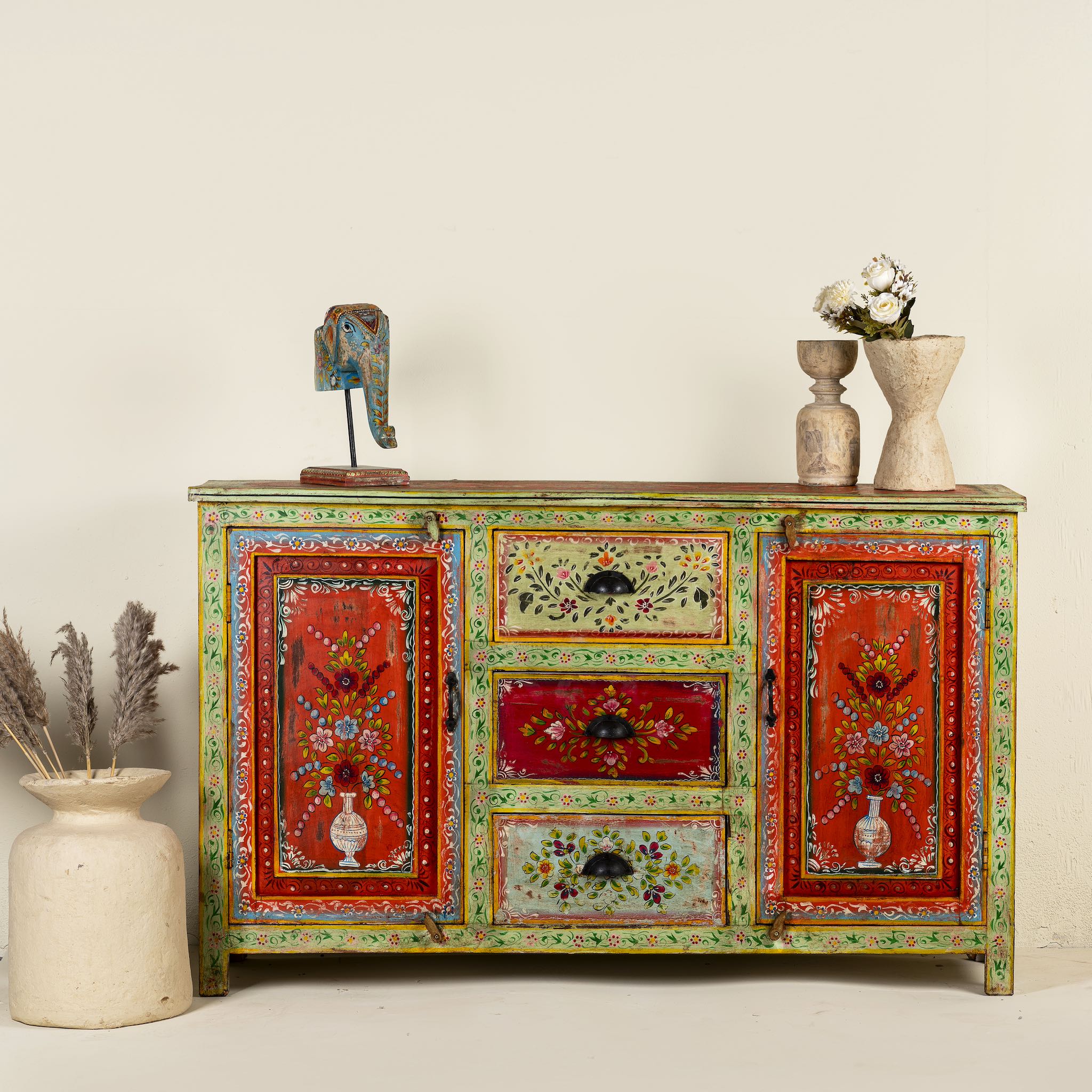 Sustainable hand painted sideboard made from reclaimed teak wood with floral motifs; bold bohemian furniture, 150 × 45 × 90 cm.