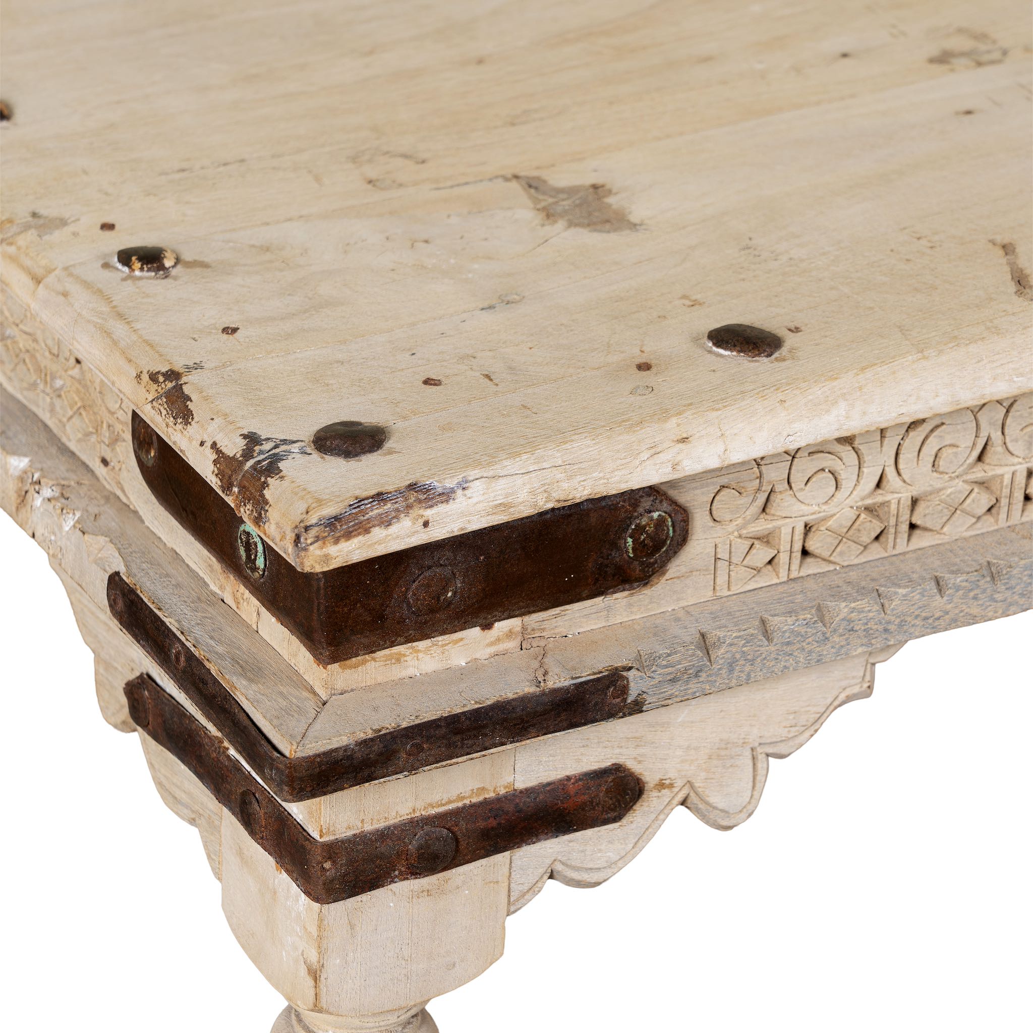 Close up image of Ibiza style coffee table teak wood, reclaimed teak with carved details; sustainable Indian coffee table, 122 × 77 × 44 cm.