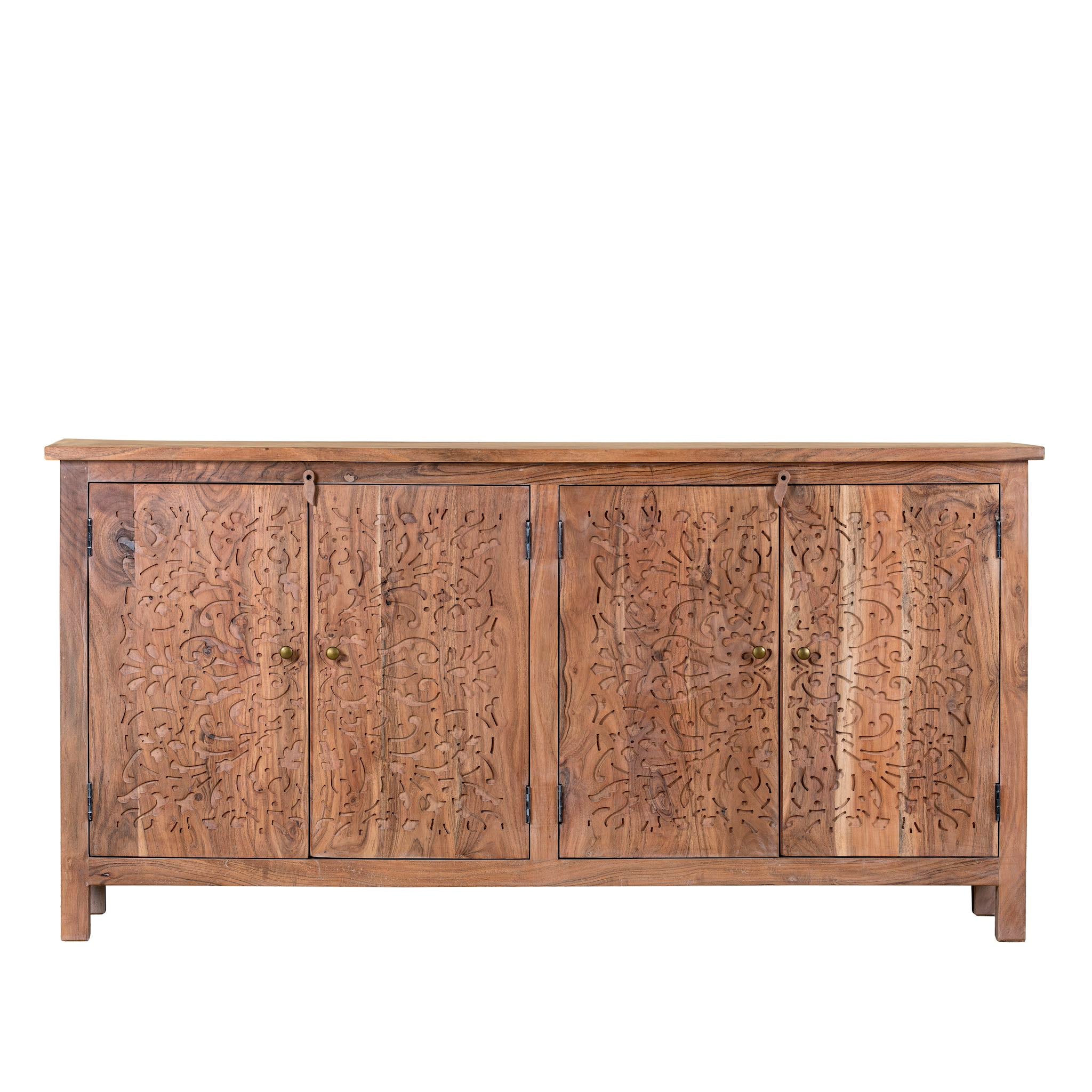 White background picture of an acacia wood sideboard with floral carvings over all 4 doors and brass fitted door handles.