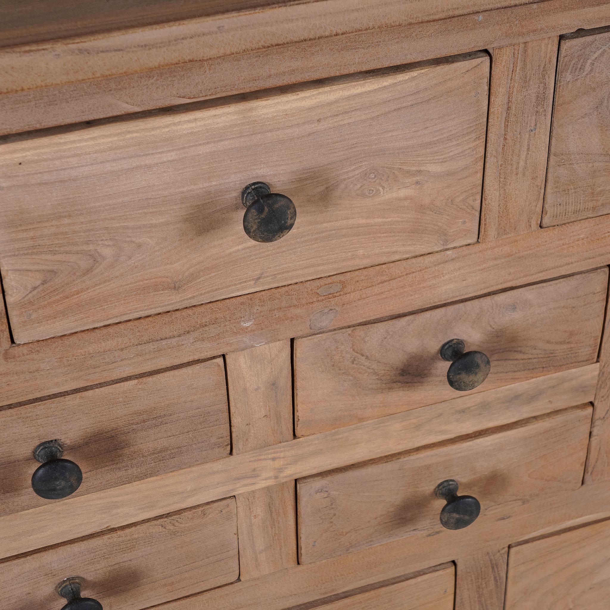 Close up image of a teak furniture chest of drawers made from reclaimed old teak wood, eco-friendly sustainable furniture in Ibiza style, 100 × 40 × 100 cm.