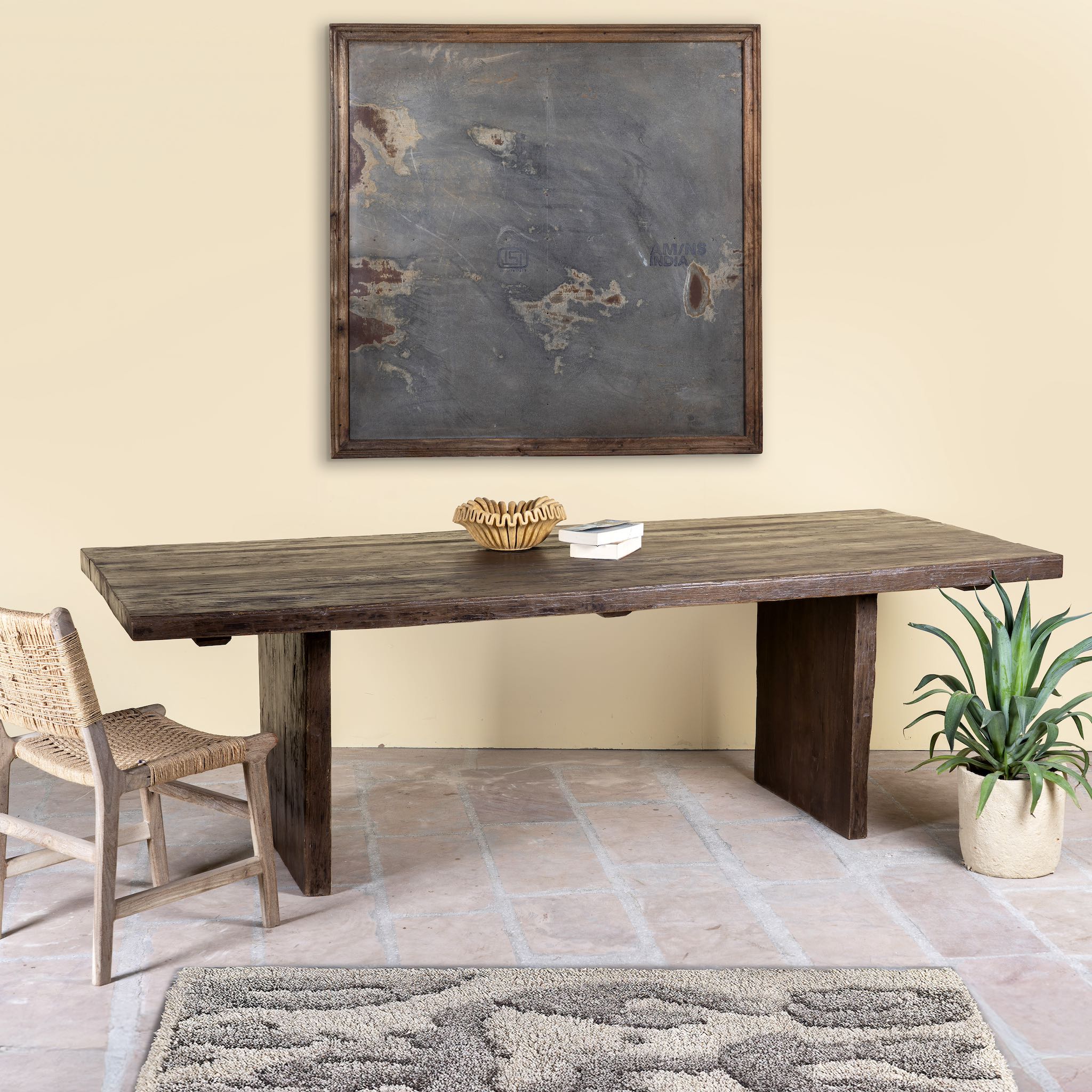 Rustic reclaimed wood log dining table with block legs, sustainable furniture design, 240×100×75 cm.