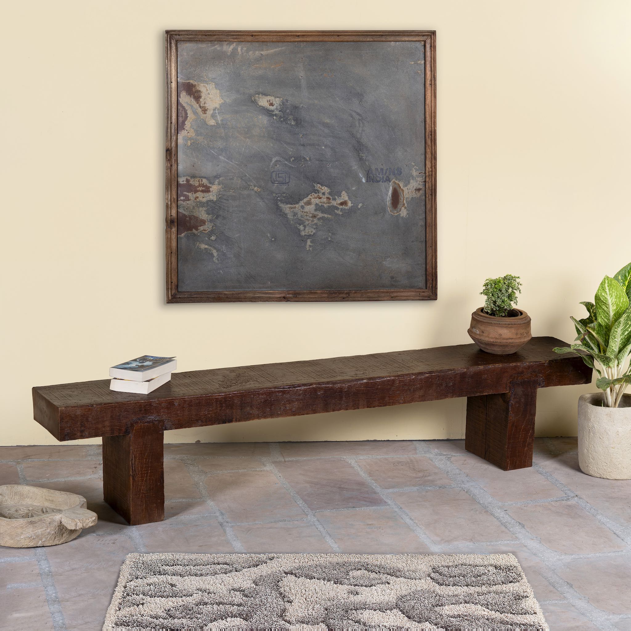 Side angle image of a rustic wood bench made of reclaimed wood, full block design, sustainable furniture for hallways, living rooms, or terraces, 200 × 30 × 40 cm.