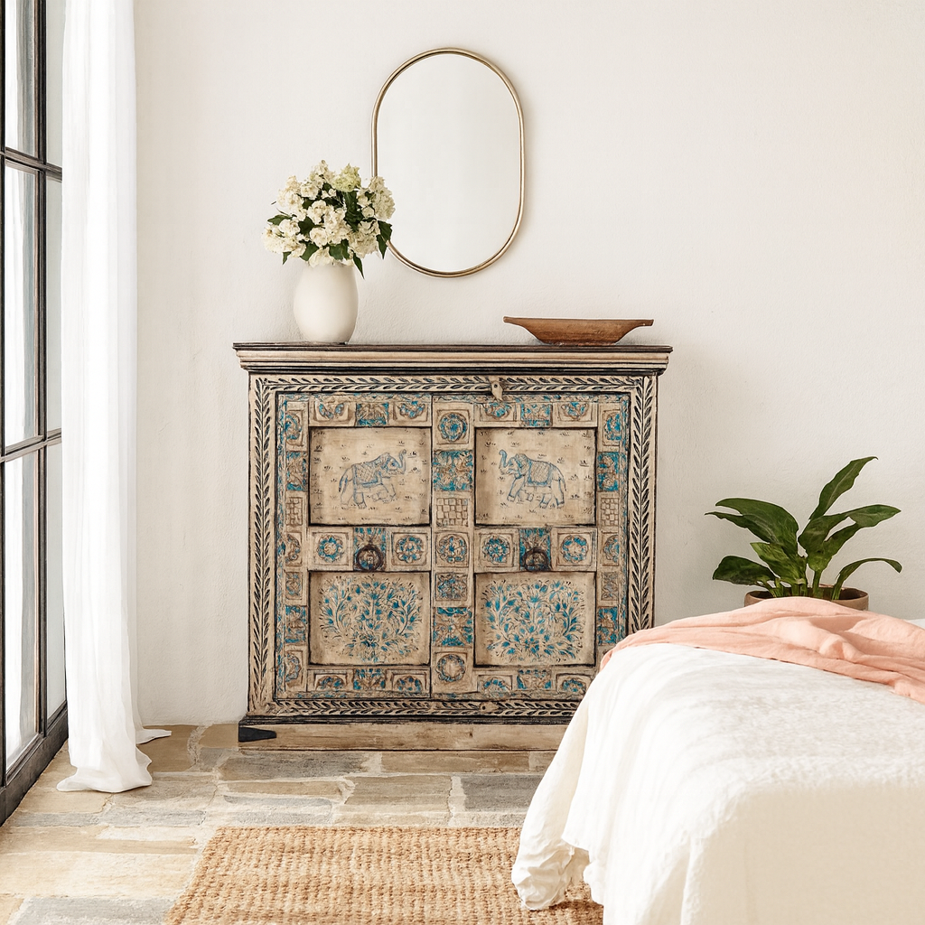 Lifestyle scene with a hand-painted cupboard made from reclaimed wood and old Indian doors – a sustainable furniture piece perfect for Indian home decor and rustic interiors.