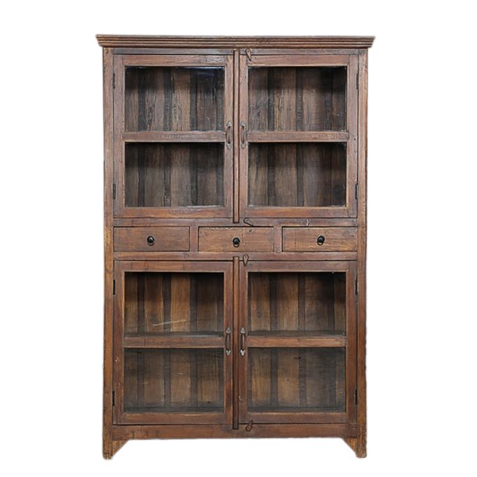 White background image of a refurbished antique teak wood showcase with four glass-panelled doors and two drawers – sustainable teak wood furniture combining timeless elegance and functional design.