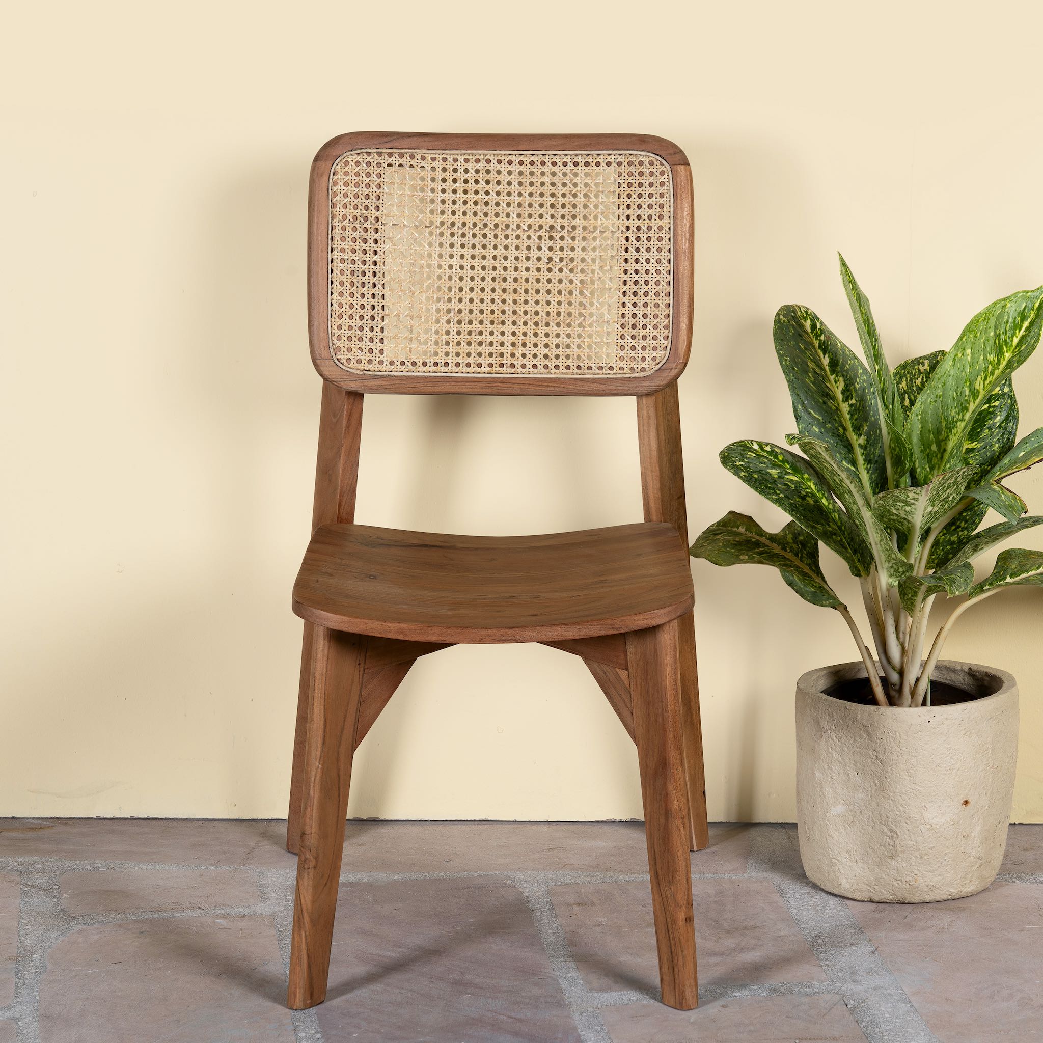 Acacia wood chair with woven rattan backrest and solid wooden frame; wooden armchair for dining or living rooms, 45 × 45 × 85 cm.