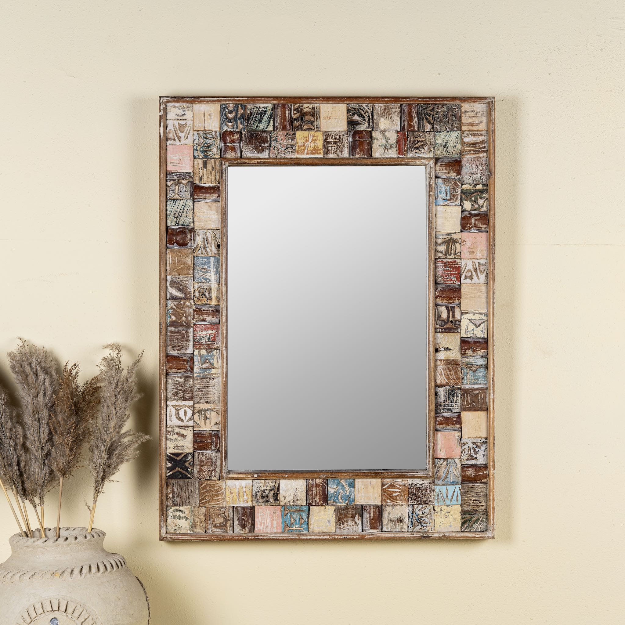 Rectangular mango wood mirror with reclaimed wood patchwork frame and distressed finish; perfect for vintage home decor and bohemian styling, 64 × 5 × 84 cm.