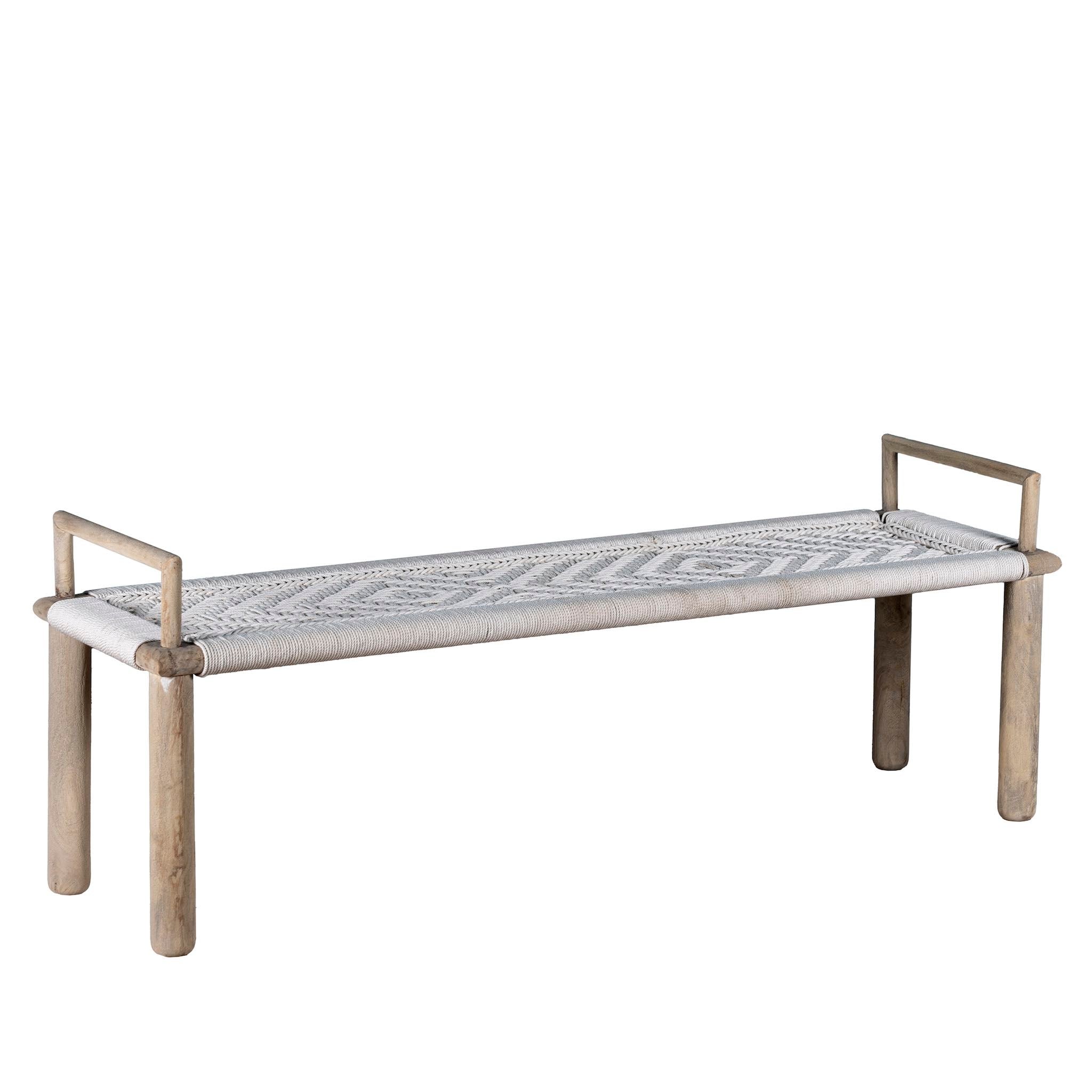 White background picture of a Japandi style wooden bench with hand woven seating in a mediterrane scene.