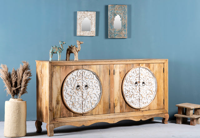 Side angle image of a carved wood furniture sideboard with whitewashed floral design, mango wood cabinet for boho chic living room, 180 × 40 × 90 cm.
