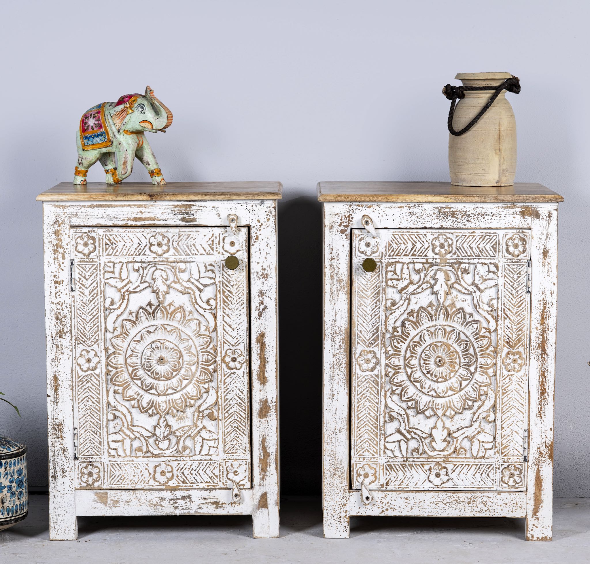 Set of two hand carved bedside tables with mandala and floral motifs; reclaimed wood in white washed furniture style, 50 × 40 × 72 cm.