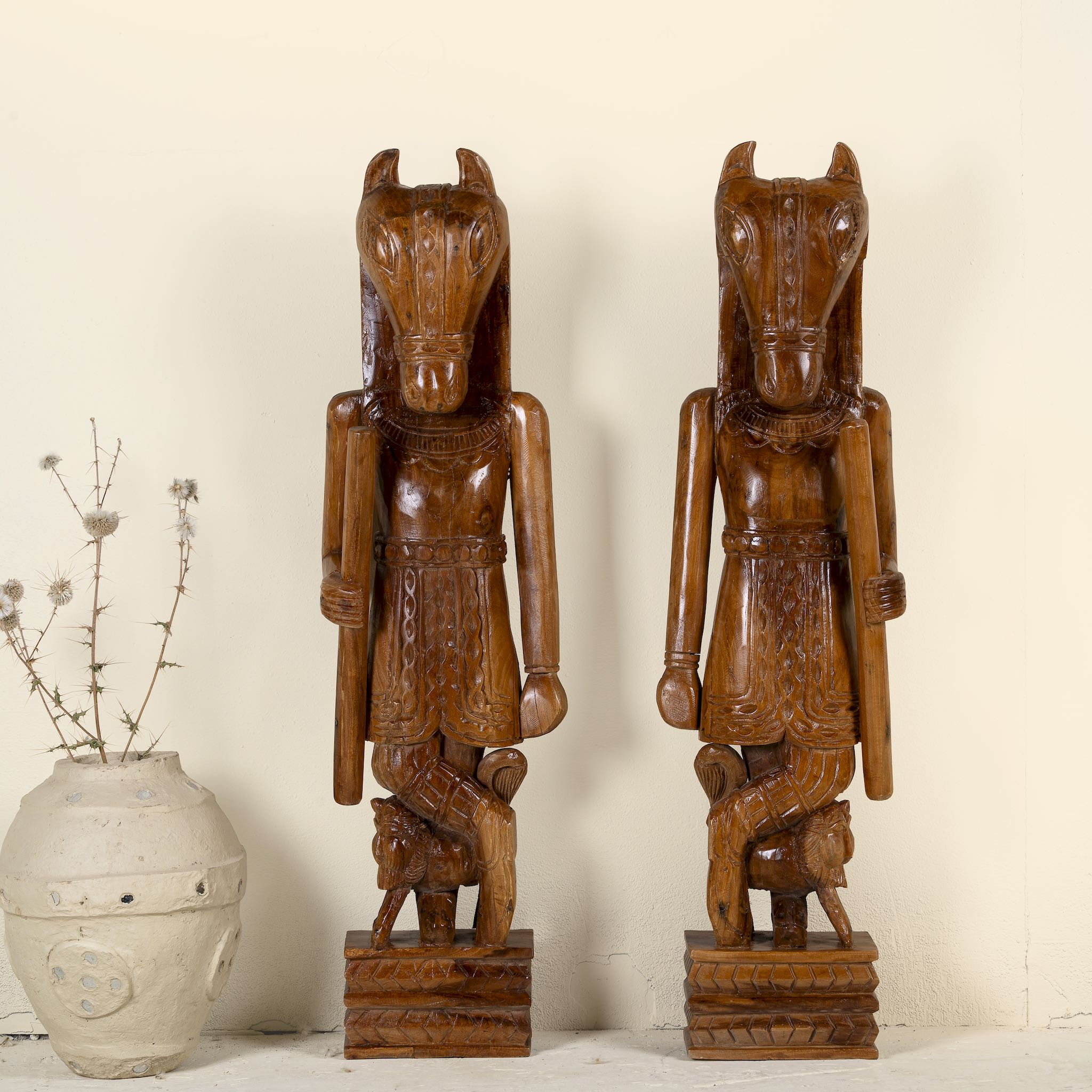 Pair of hand-carved Indian house guardian statues in exotic style, made from reclaimed wood; sustainable furniture, 40 × 20 × 120 cm.