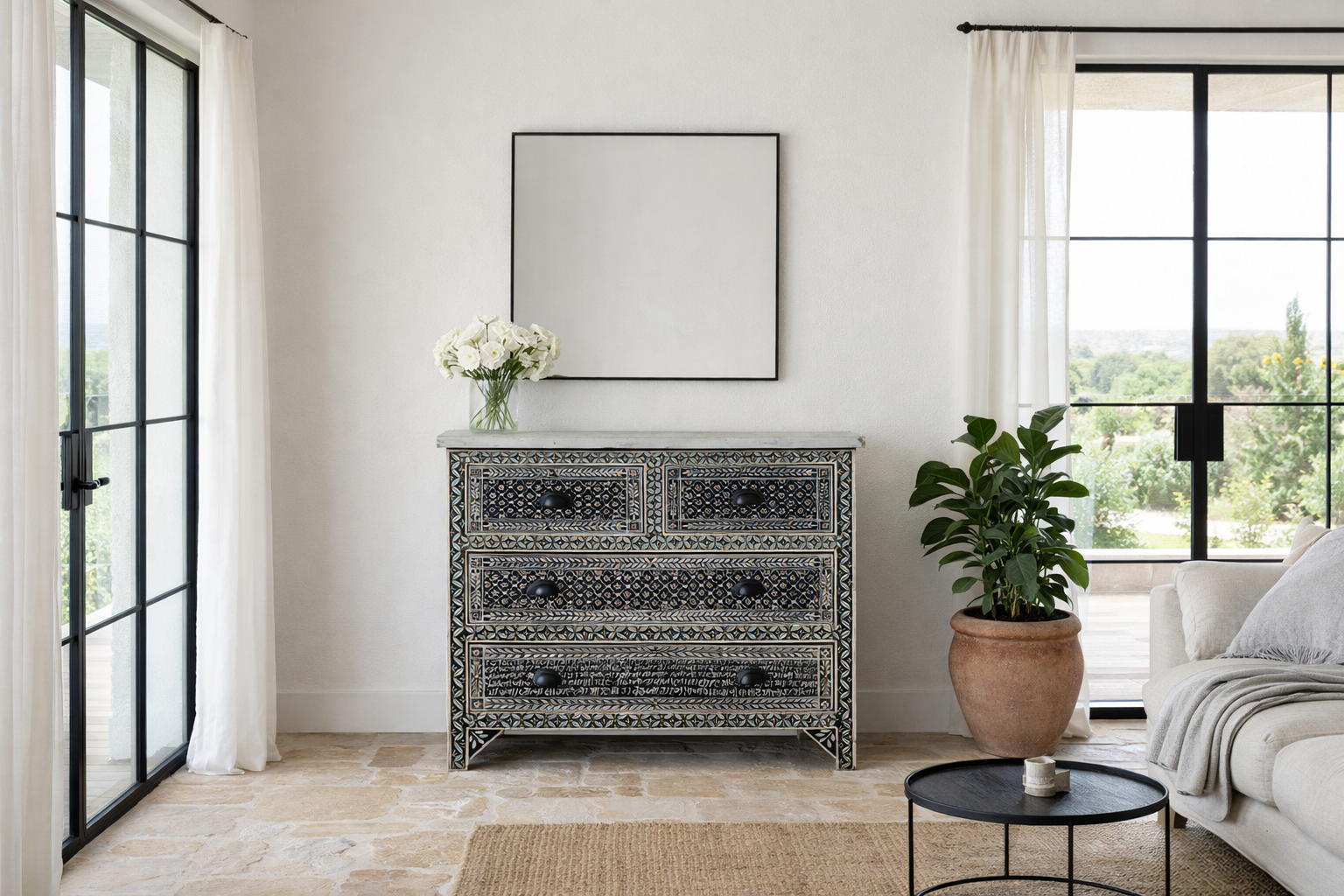 Lifestyle imagination of a of a of a hand-painted Indian chest of drawers made from recycled wood – unique furniture featuring colourful motifs and antique craftsmanship.