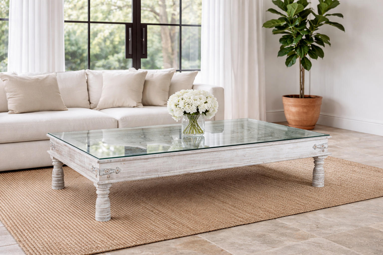 Lifestyle imagination of a white washed old door coffee table made of antique teak wood; handcrafted Indian coffee table, 185 × 109 × 46 cm.
