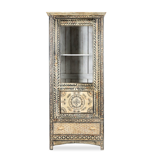 White background image of a hand-painted Indian display cabinet with engraved Sanskrit motifs, drawer and compartments – unique Indian furniture made from recycled wood with artisanal detail.