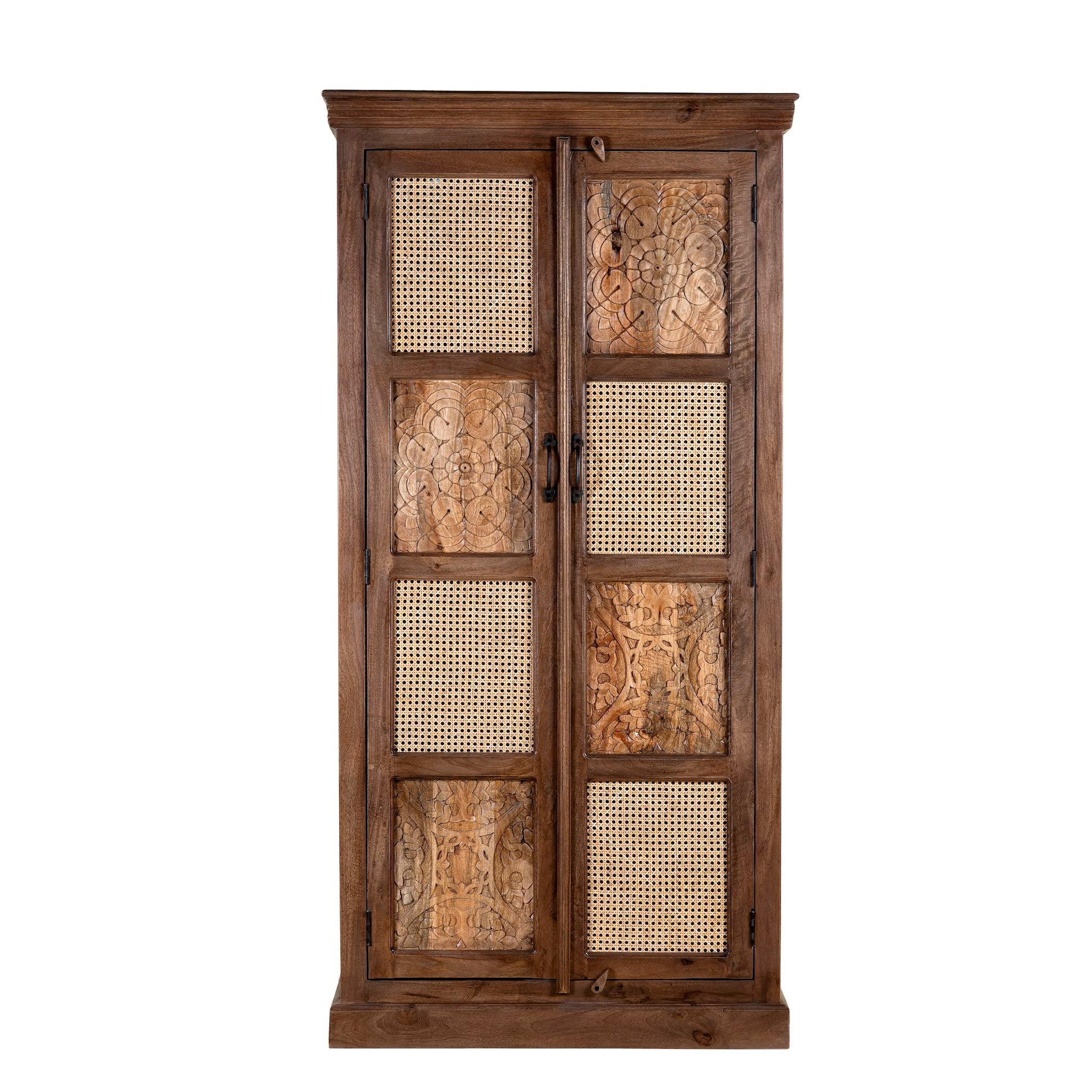 White background picture of a hand carved mango wood cabinet with floral design, 2 doors and one drawer in vintage design.