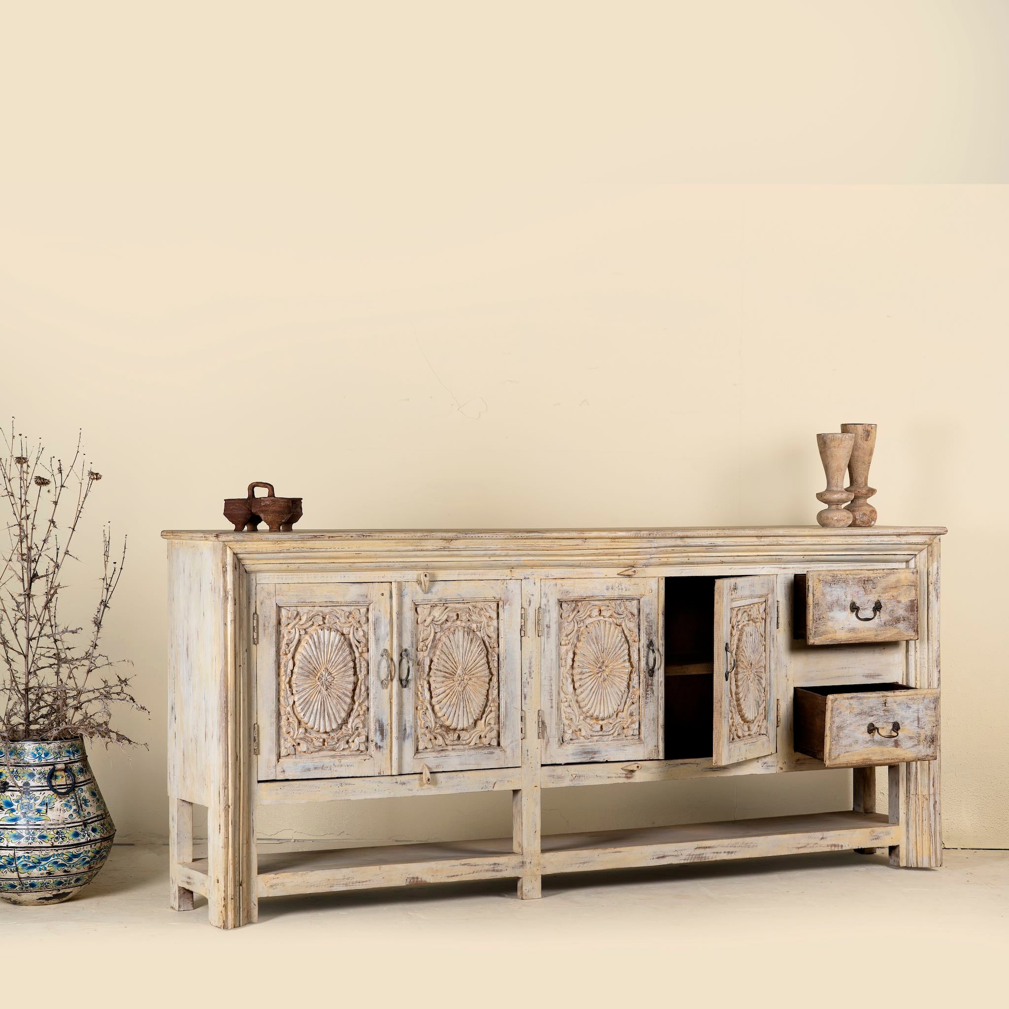 Open drawer image of a vintage console table made from reclaimed wood with carved teak front, two drawers, four cupboards, and lower shelf, 201 × 42 × 100 cm.