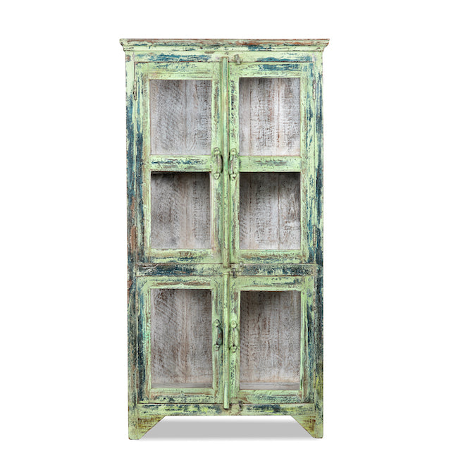 White background image of a refurbished teak wood showcase with distressed green finish – sustainable furniture with boho style interior appeal and glass-panelled storage.