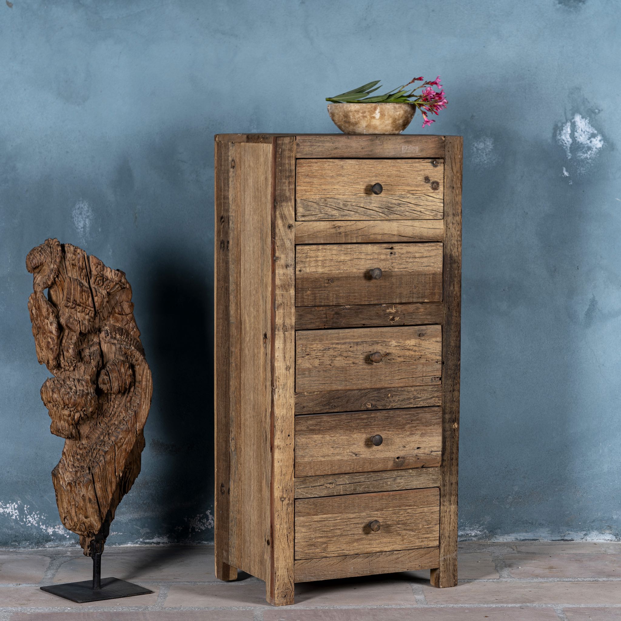 Side view image of a tall bathroom cabinet made from reclaimed wood with six drawers and rustic finish, 50 × 35 × 110 cm.