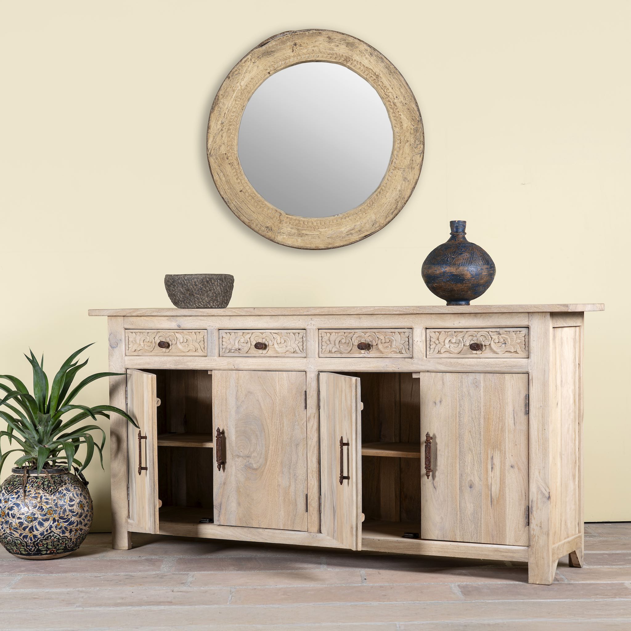 Open door image of a hand-carved mango wood sideboard with sandblasted finish – a rustic mango wood furniture piece ideal for Ibiza style interiors.