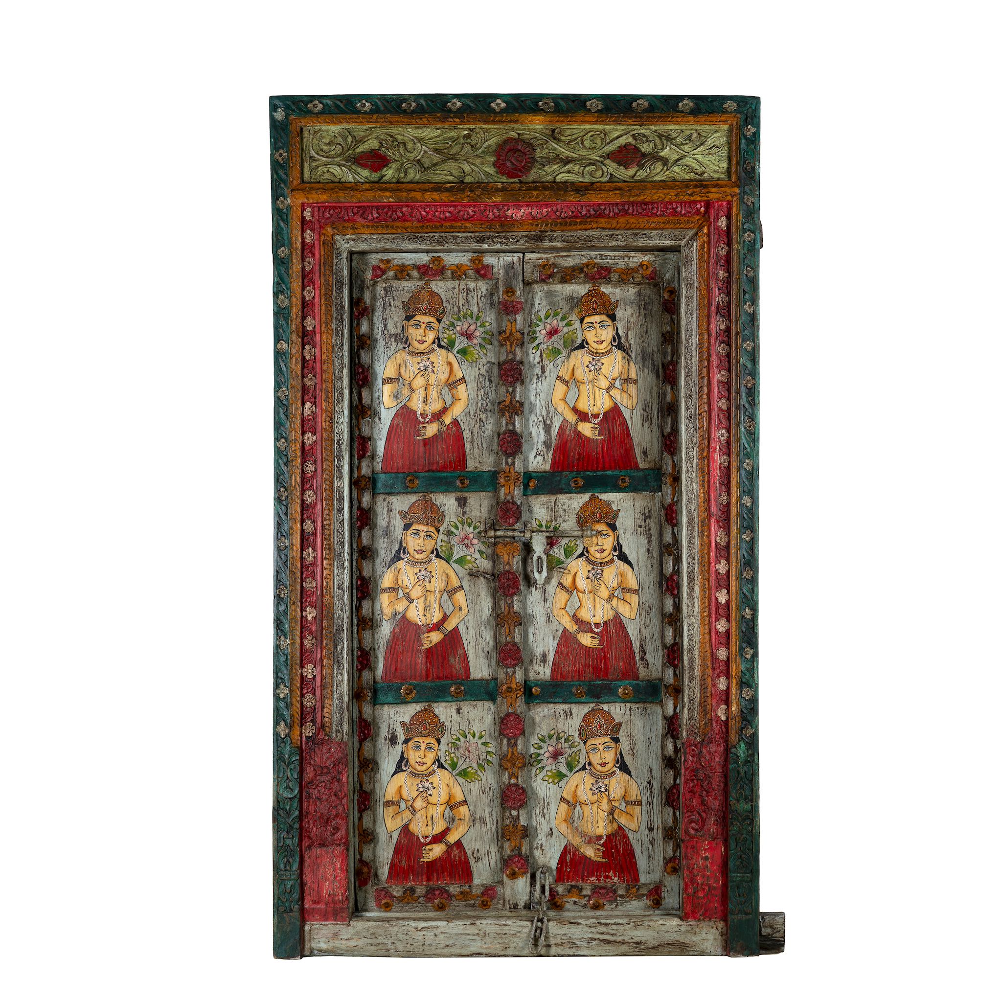 White background image of an antique Indian teak wood door with hand-painted figures holding lotus flowers, vintage wall panels and vintage home decor.