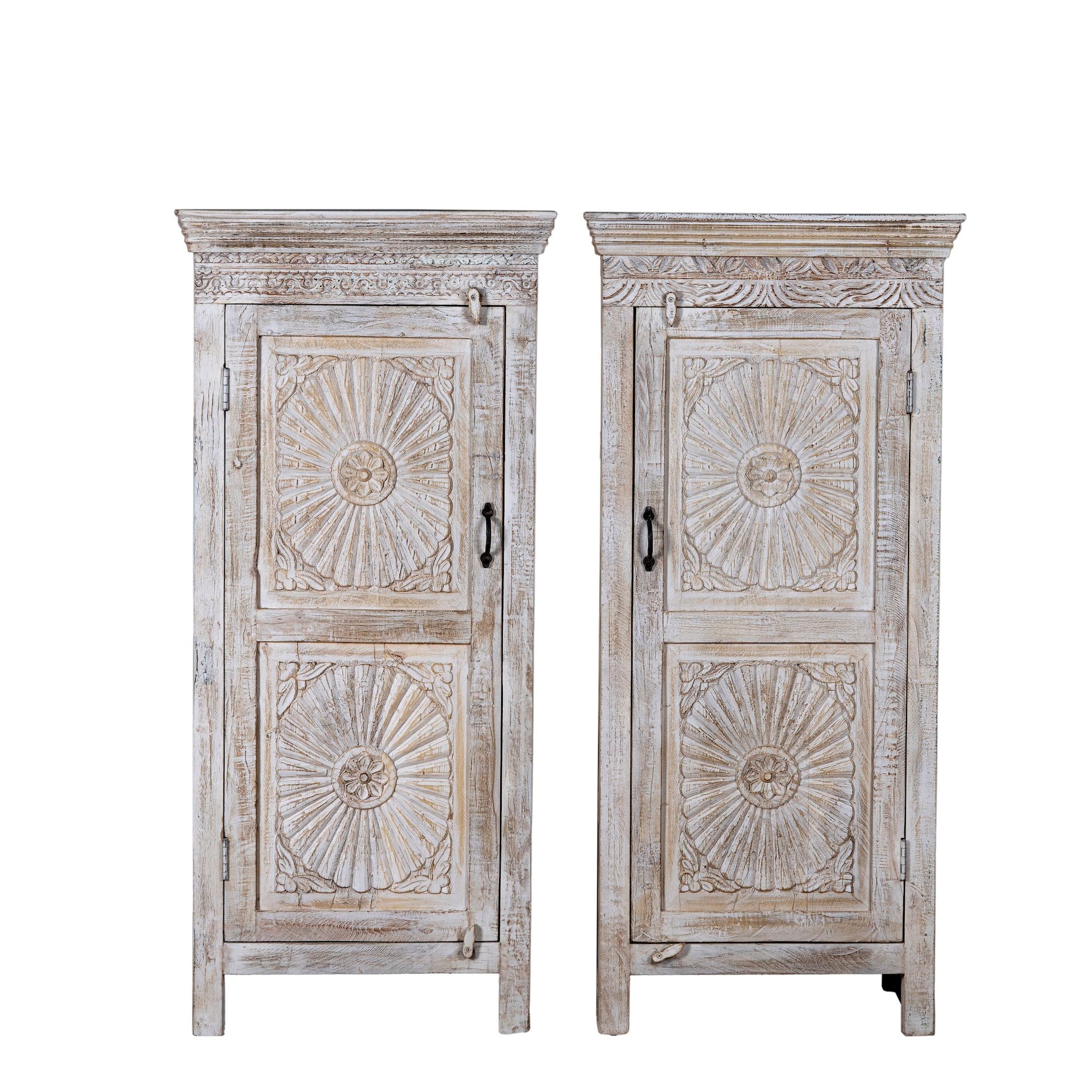 White background image of a white washed wood cabinet with hand-carved floral design, Moroccan-style reclaimed wood furniture, 134 × 60 × 45 cm.