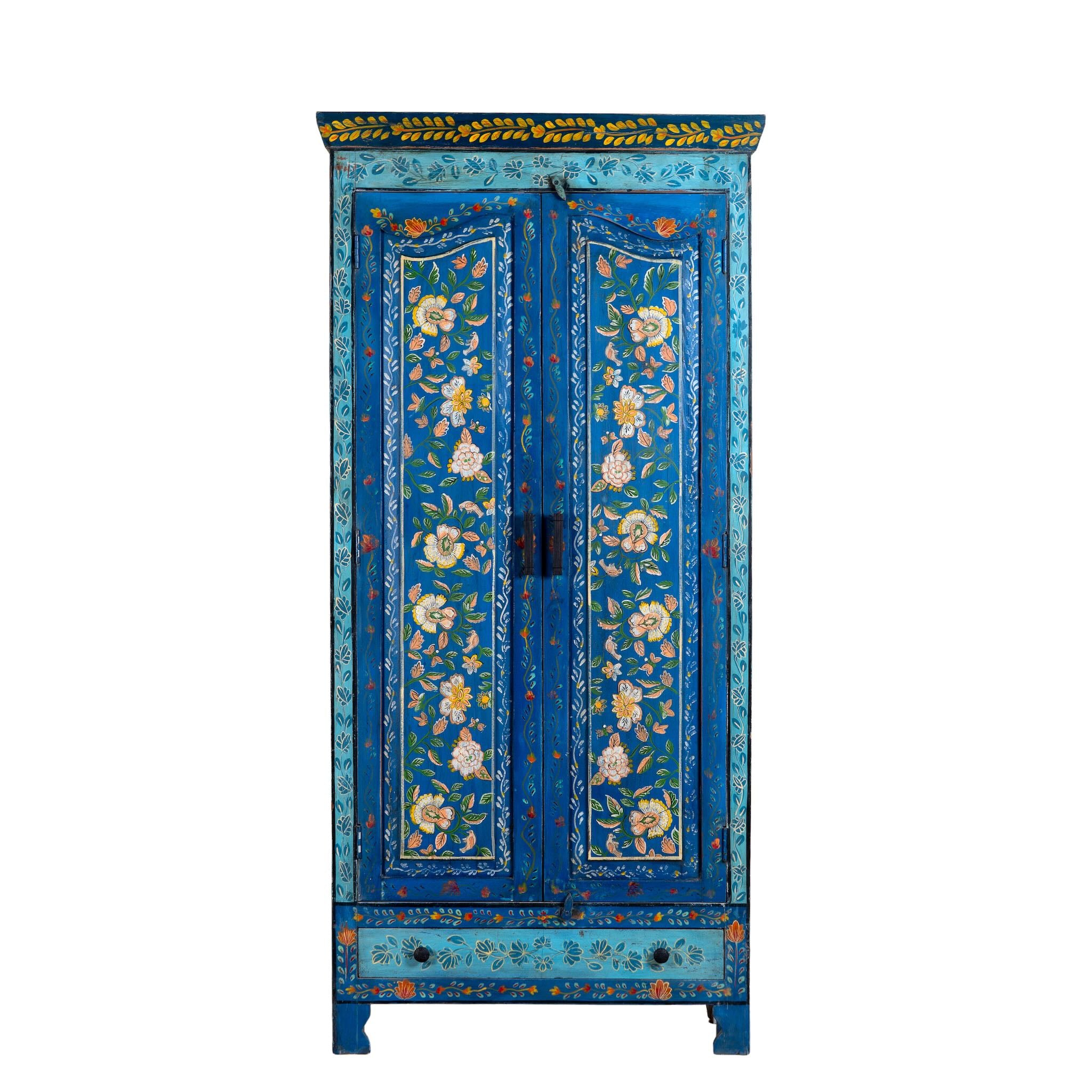 White background image of a hand-painted wardrobe made of reclaimed wood in vibrant blue floral design – Yuvika model by Om Home & Garden