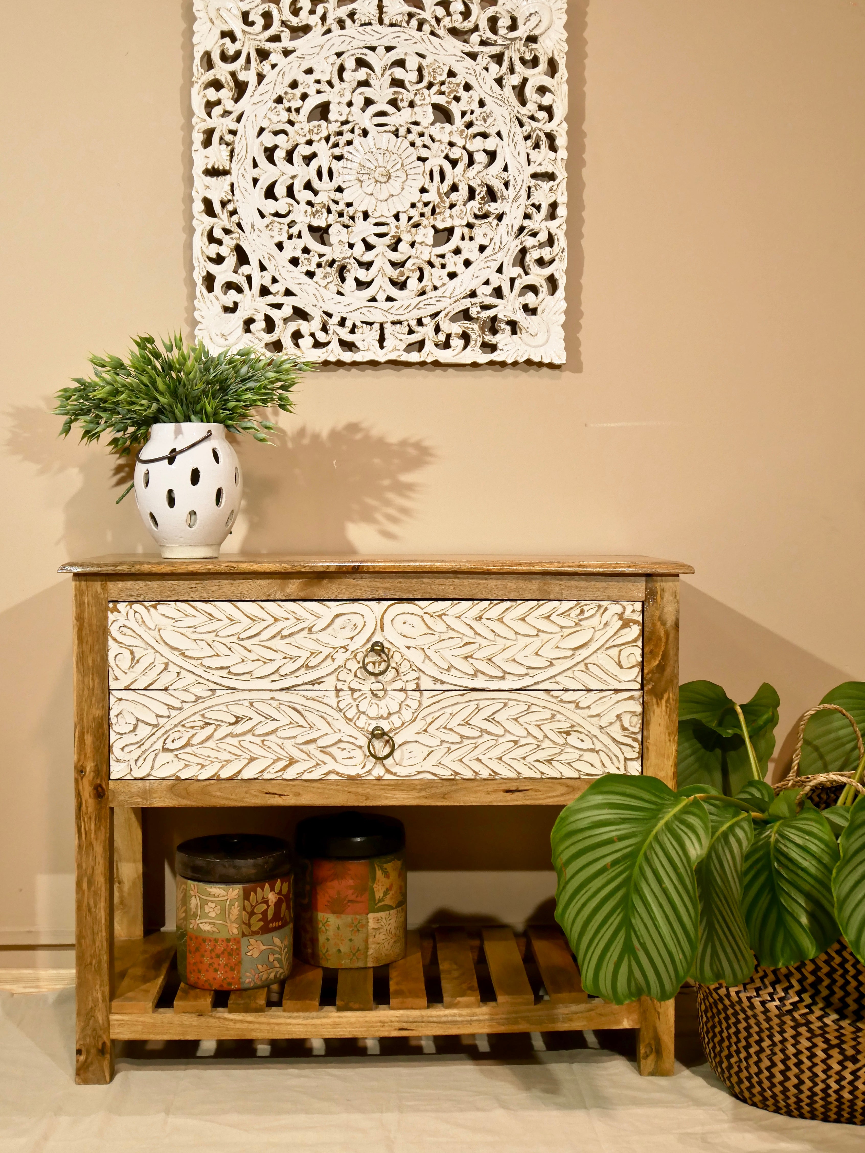 White washed mango wood console table with floral hand-carved drawers and lower shoe shelf; rustic mango wood furniture, 90 × 40 × 75 cm.