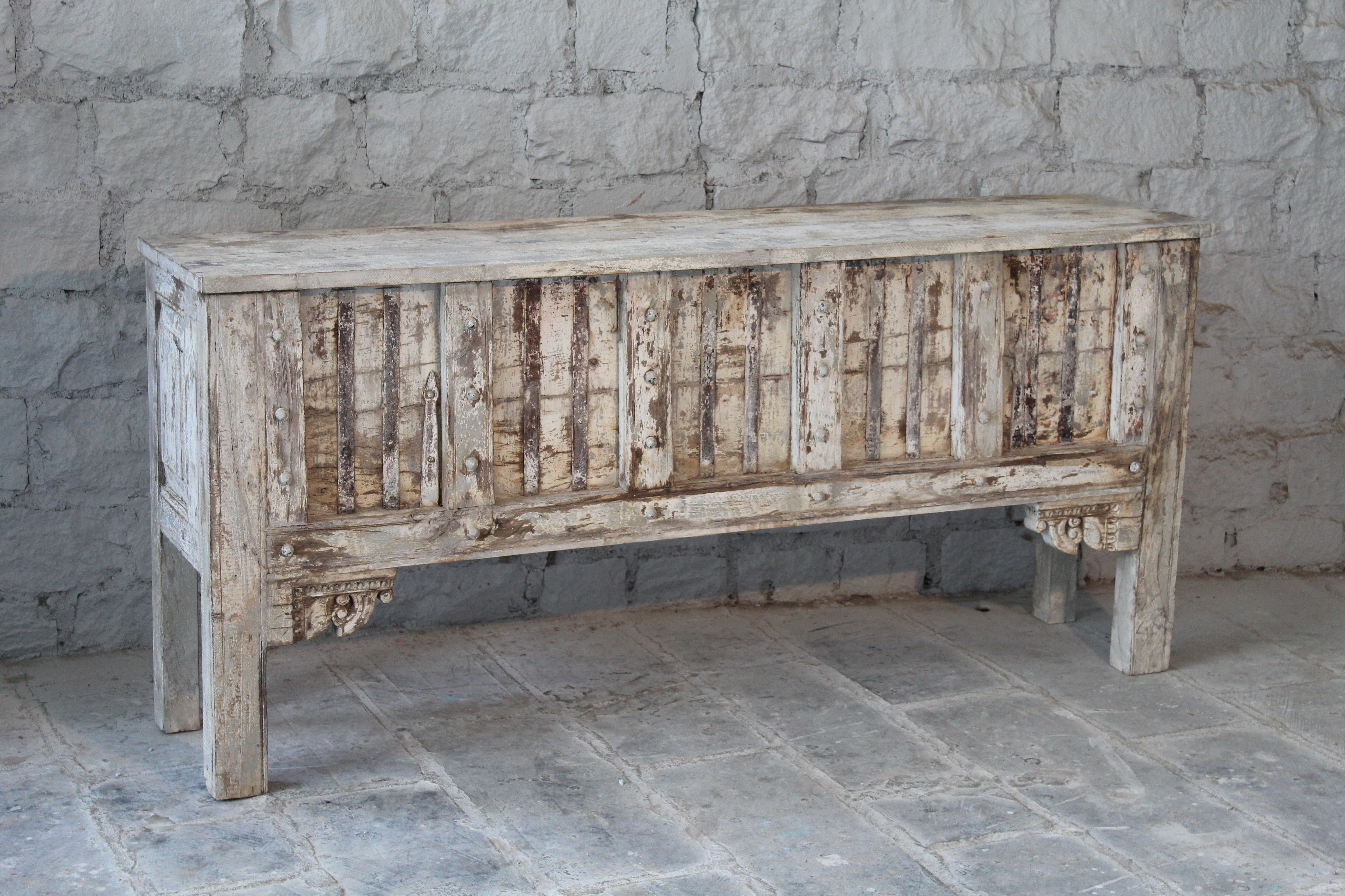 Warehouse image of a vintage teak wood console table with folding front and rustic finish; handcrafted from reclaimed wood, 156 × 42 × 82 cm.