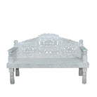 White background image of a hand carved mango wood bench Aikya, featuring intricate floral detailing and turned legs, representing traditional Indian craftsmanship and authentic hand carved wooden furniture design.