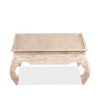 White background image of a Indian coffee table made from mango wood with Orissa-style carvings and glass top; mango wood coffee table, 90 × 90 × 30 cm.