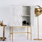 Open door image of a tall whitewashed mango wood cabinet with carved lines and antique brass iron base, 91 × 154 × 43 cm.