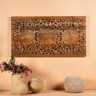 Hand-carved mango wood wall panel with floral engravings in natural finish – Arusha model by Om Home & Garden
