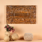 Hand-carved mango wood wall panel with floral motifs in natural finish – Arvavasu model by Om Home & Garden