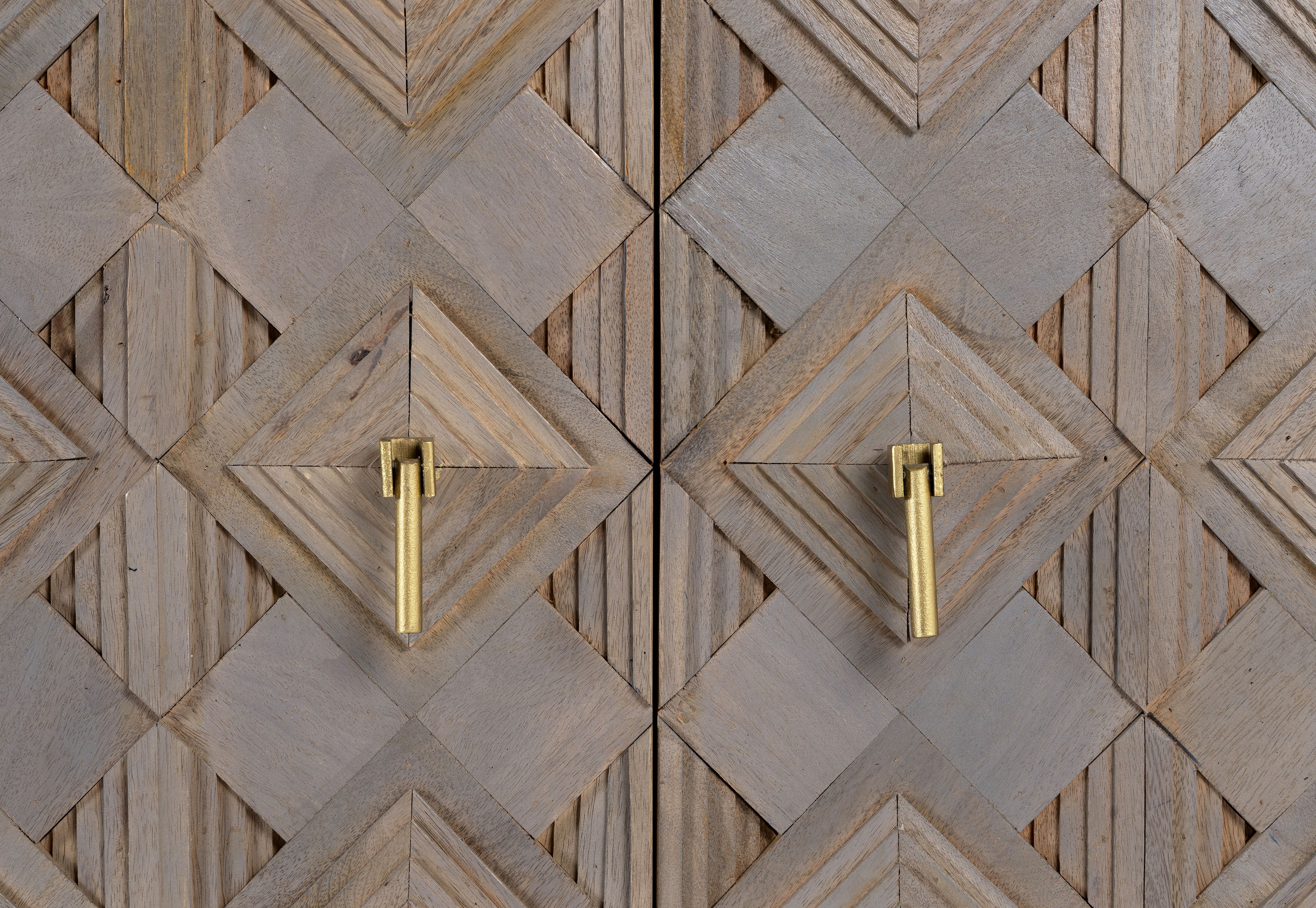 Close-up of Avighna sideboard showing detailed carving and natural grey wash finish