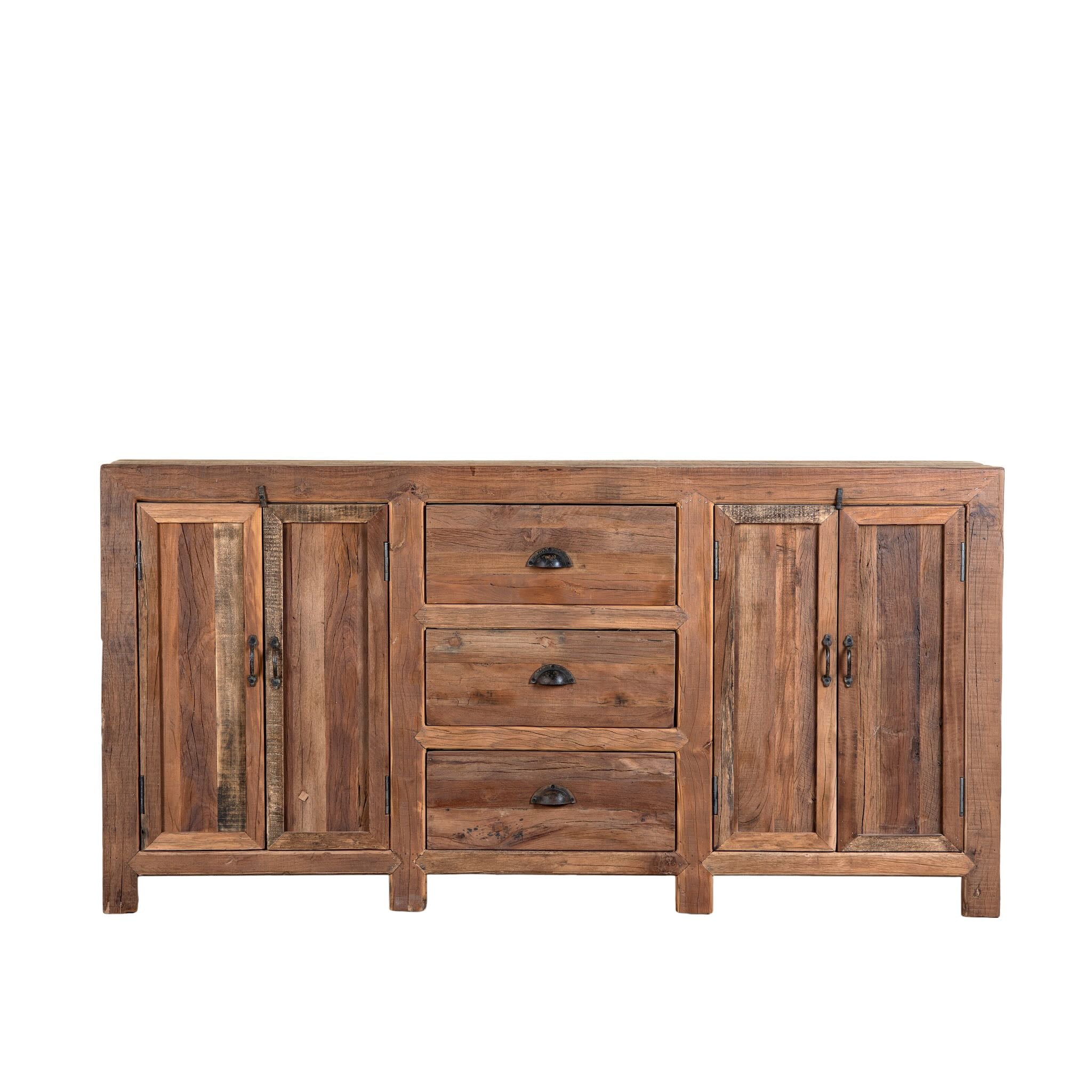 White background image of a reclaimed wood sideboard Avika in a rustic minimalistic design with three drawers and two double-door cabinets. A sustainable furniture piece with warm wood tones and black iron handles, perfect for eco-conscious interiors.