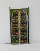 Ayandh hand-painted teak door panel featuring sacred animal motifs and folk figures with a weathered floral frame—a vibrant example of teak door panels and unique Indian wall decoration.