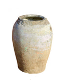 White background image of a antique clay vase with aged texture – a handcrafted Bali style clay vase ideal for Indian home decoration and earthy boho interiors.