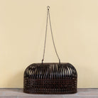 Chitra metal pendant light with hand-forged slatted design and iron chain suspension—an artisanal example of hand crafted metal lamps and bold metal pendant lights for high ceilings.