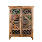 White background image of a handcrafted cabinet made from mango wood, featuring double doors with intricate multicoloured geometric latticework panels, combining natural wood tones with a vibrant, artisanal aesthetic.
