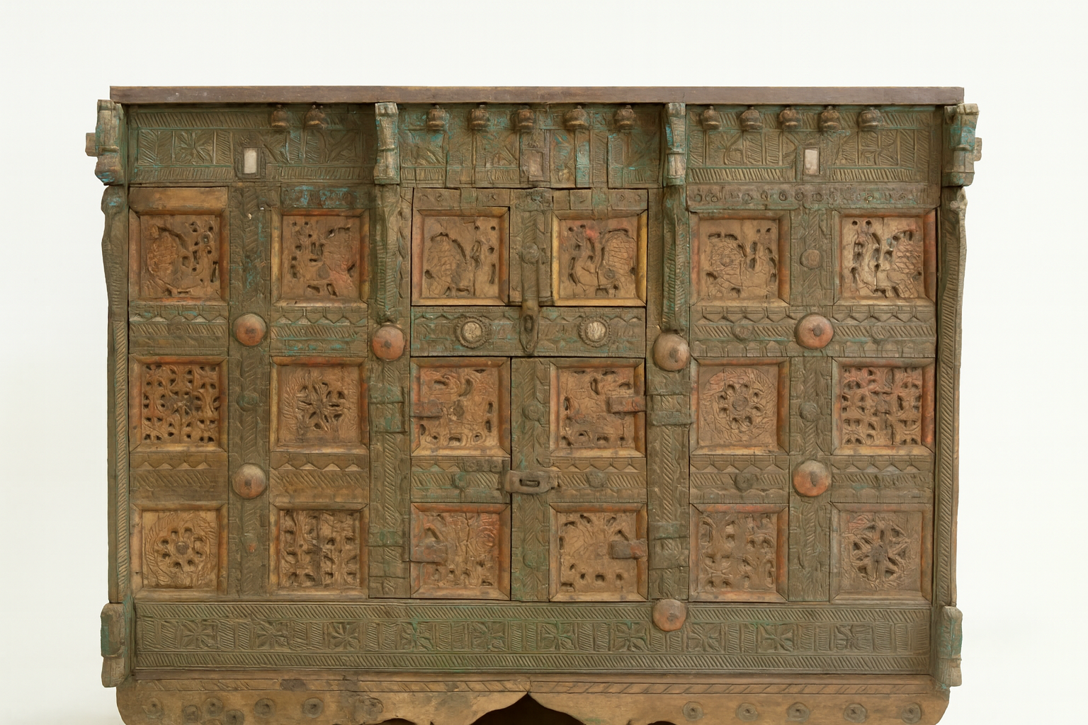 White background image of a classic Indian furniture Damchya chest, reclaimed teak wood with hand-carved details and iron fittings; perfect for bohemian interior décor, 130 × 66 × 110 cm.