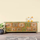 Hand painted mango wood chest of 11 drawers with floral motifs; artisanal mango wood furniture and hand painted furniture, 250 × 41 × 85 cm.