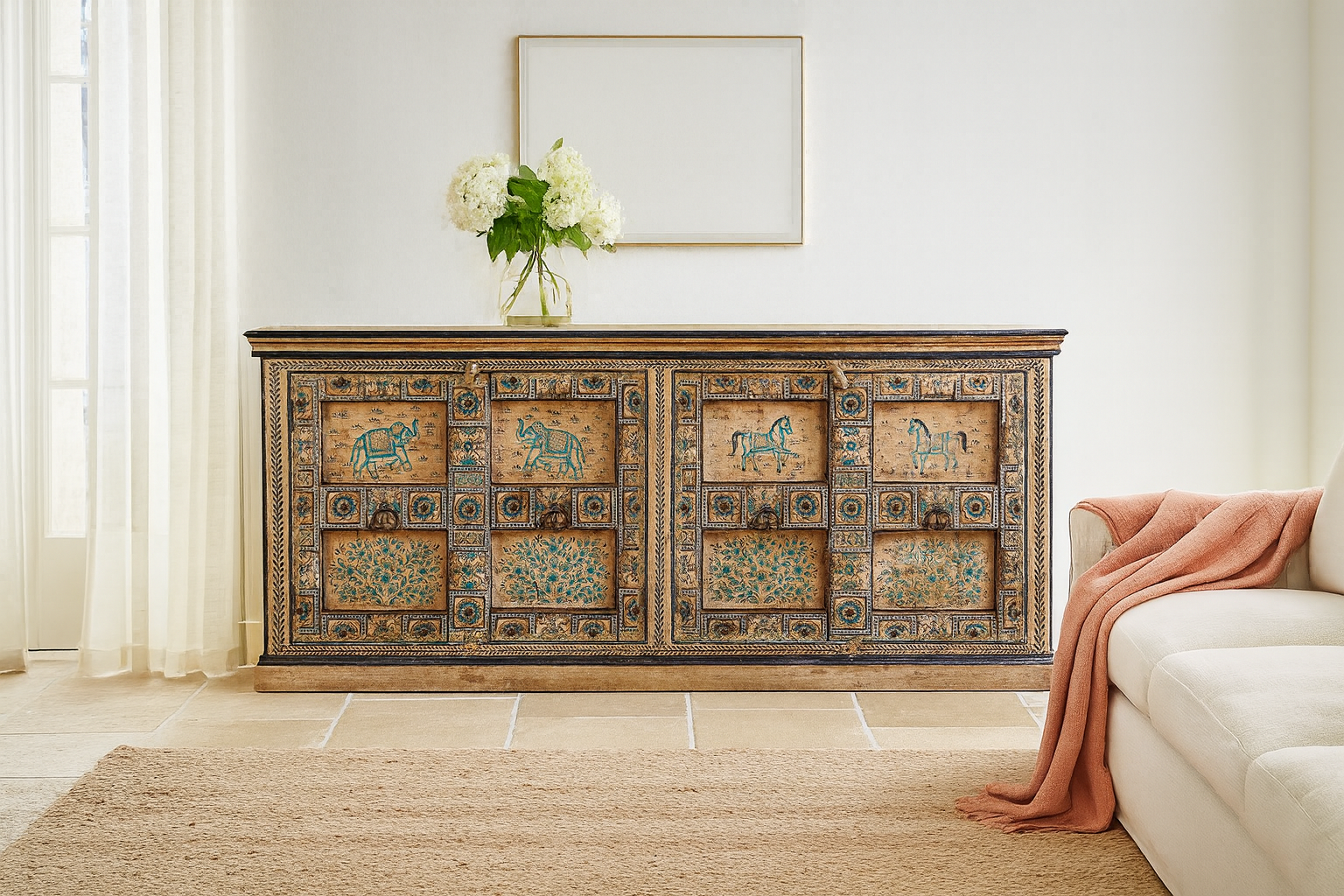 Lifestyle imagination of a unique sideboard made of recycled wood with hand painted Indian motifs in blue and gold; sustainable furniture for dining rooms or hallways, 220 × 44 × 98 cm.