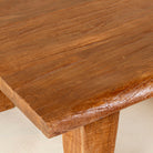 Close up picture of a rectangular rustic Indian coffee table crafted from solid reclaimed wood, a timeless example of unique wooden furniture.