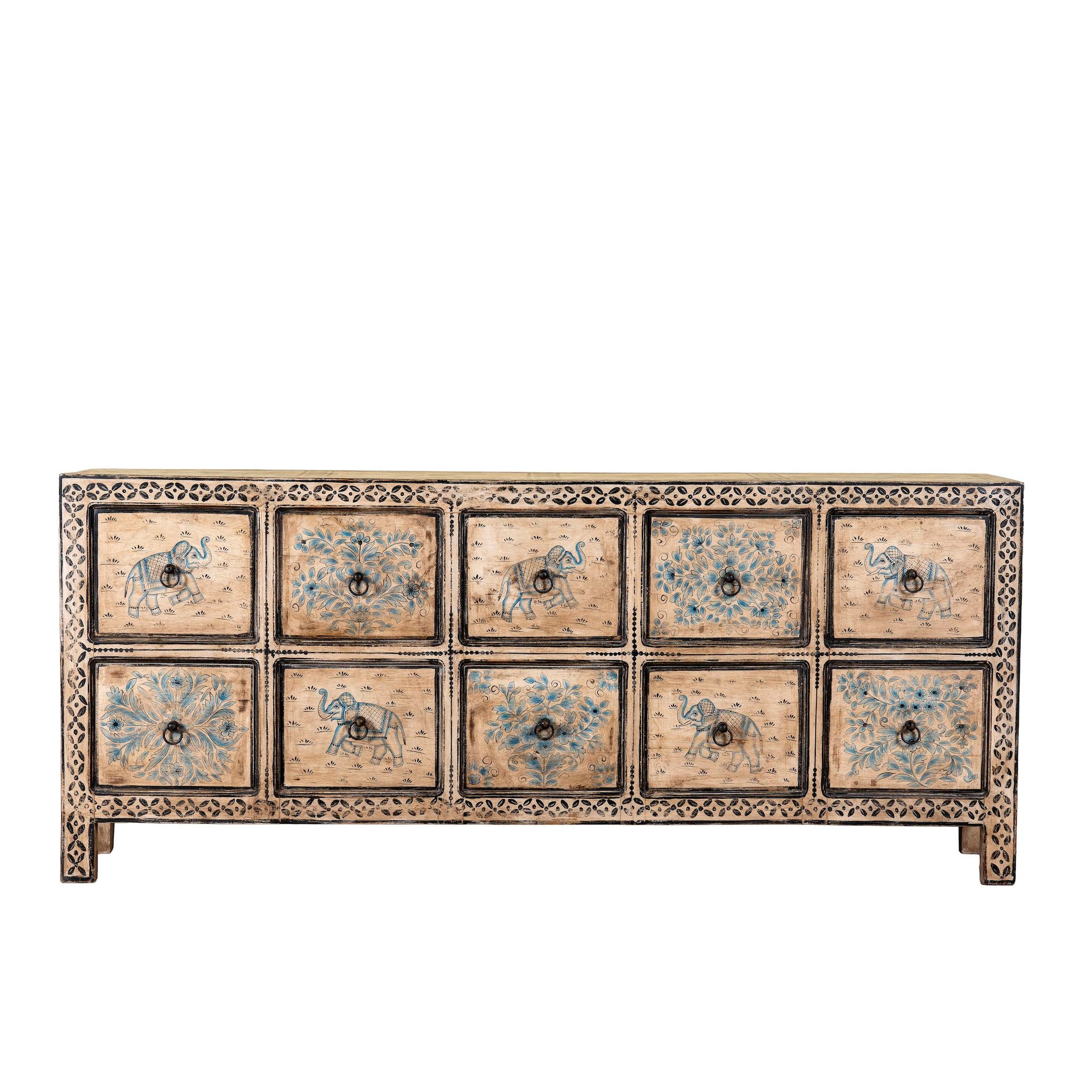 Wite background image of a hand painted mango wood chest of 10 drawers with elephant and floral motifs; hand painted furniture for a boho chic living room, 200 × 41 × 85 cm.