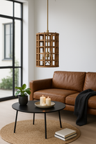Lifestyle image of a wooden vintage ceiling lamp made of natural mango wood with brass-clad edges and a grid design – elegant mango wood lighting for kitchens, dining rooms, or living spaces.