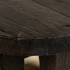 Close up picture of a rustic minimalistic style black coffee table made of reclaimed wood.