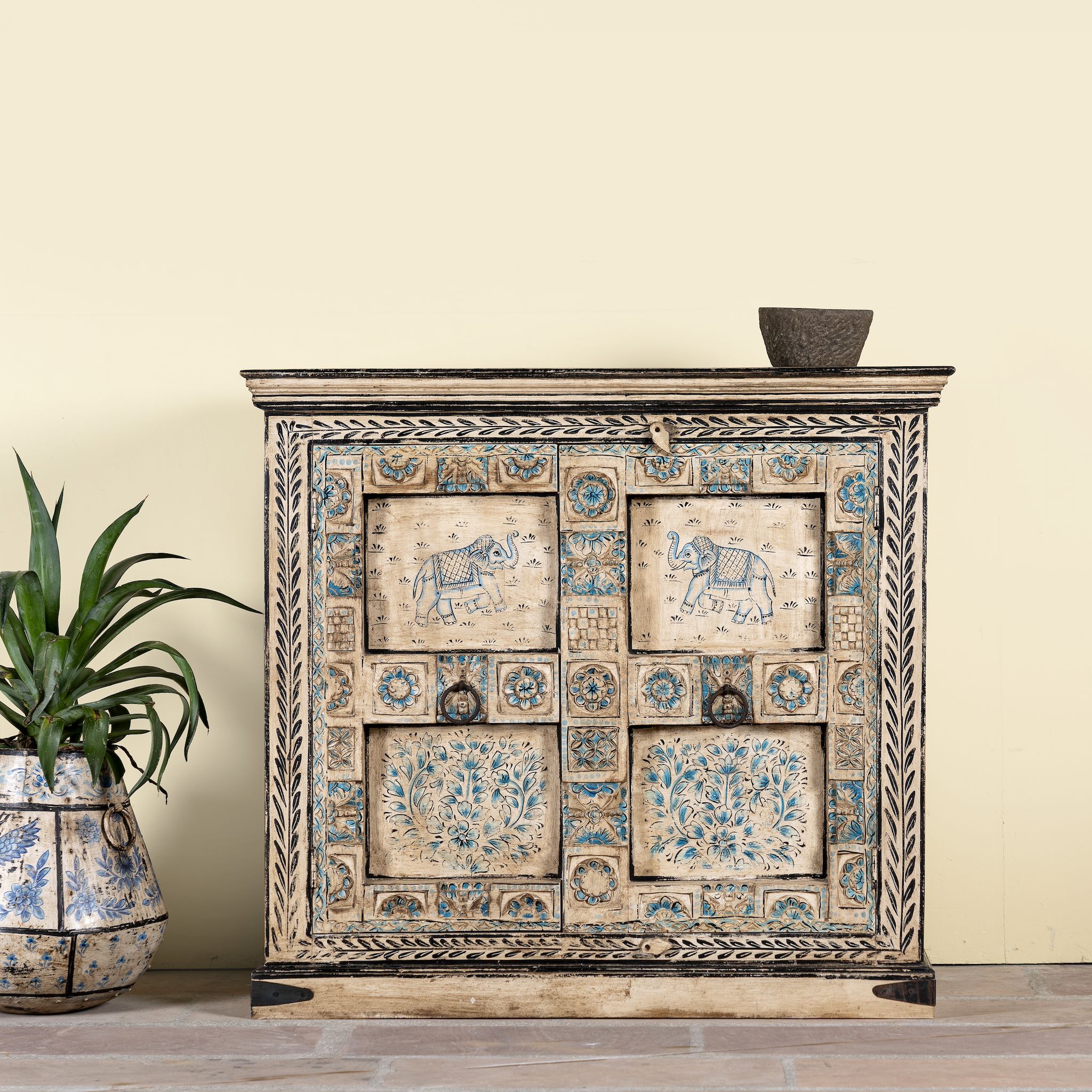 Hand-painted cupboard made from reclaimed wood and old Indian doors – a sustainable furniture piece perfect for Indian home decor and rustic interiors.
